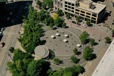 Rosa parks circle grand rapids - The Ecliptic at Rosa Parks Circle by Maya Lin is a sculpture within a 3.5-acre triangular urban park in the heart of Grand Rapids. Epitomizing urban enrichment, the project combined infrastructure renovation with an art piece. The park reinstates Monroe Street that was closed to traffic with the creation of a pedestrian mall in the late 1970s.